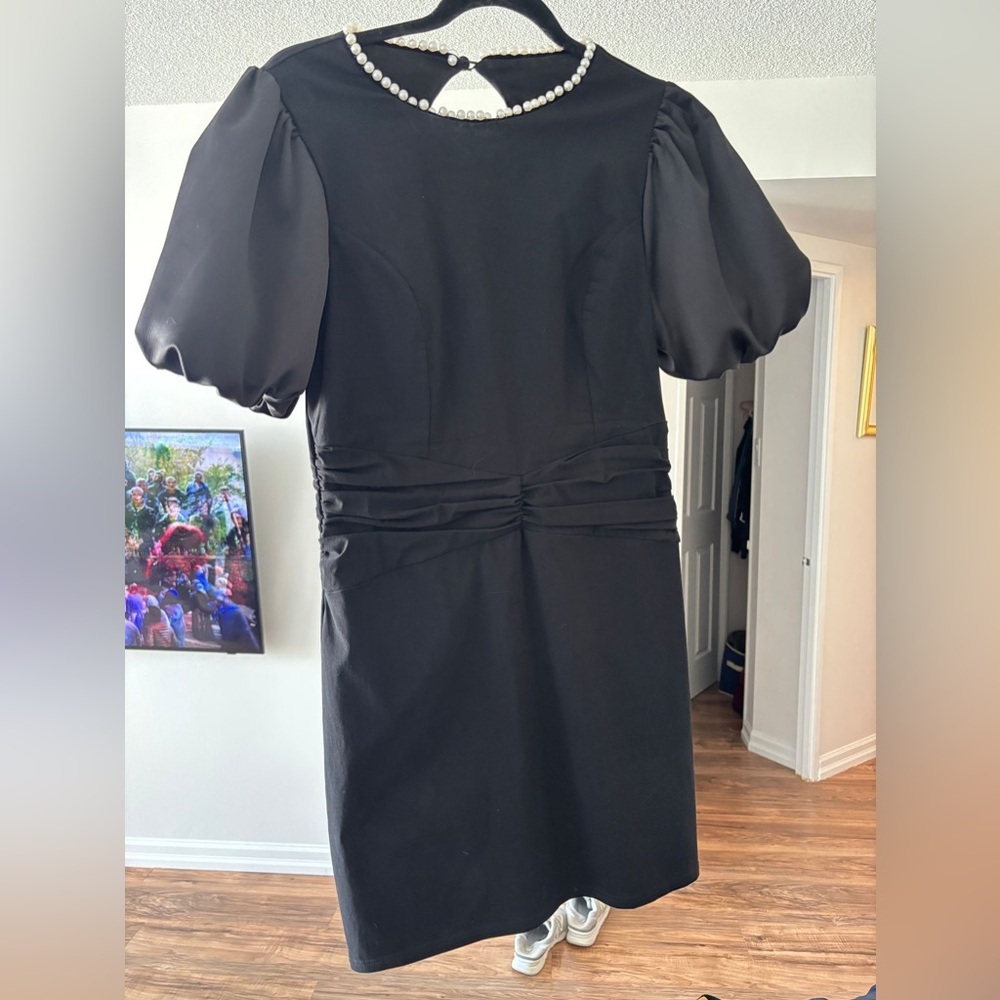 Elegant Black Dress with Pearl Detail